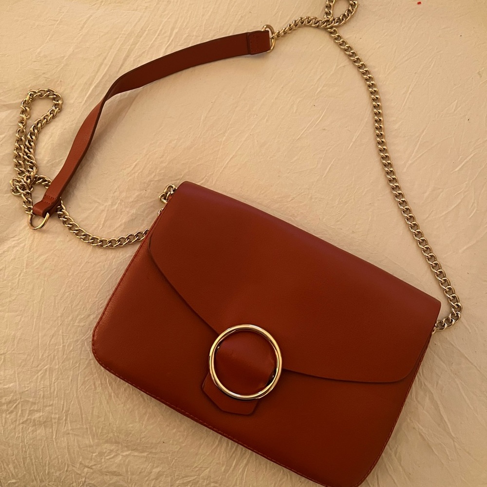 Orange crossbody faux leather bag
